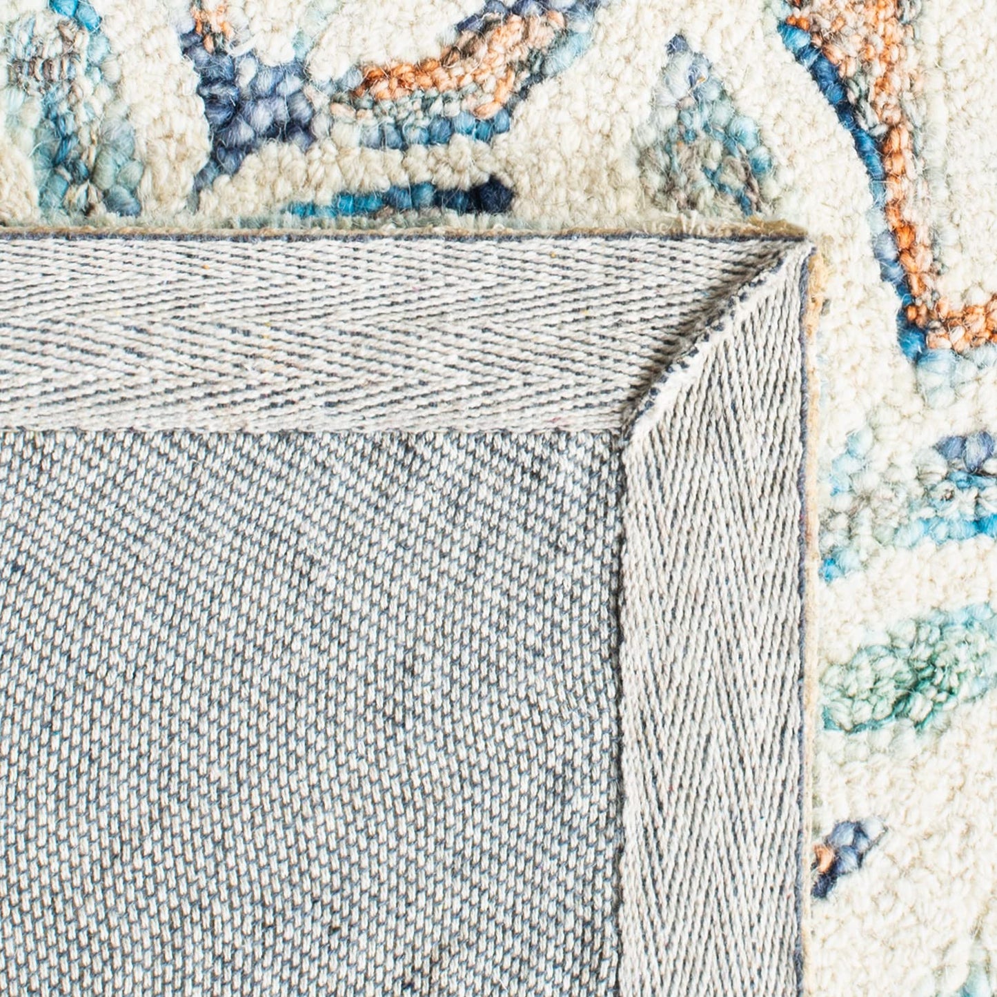 SAFAVIEH Capri Collection Area Rug - 6' x 9', Ivory & Blue, Handmade Wool, Ideal for High Traffic Areas in Living Room, Bedroom (CPR208A)