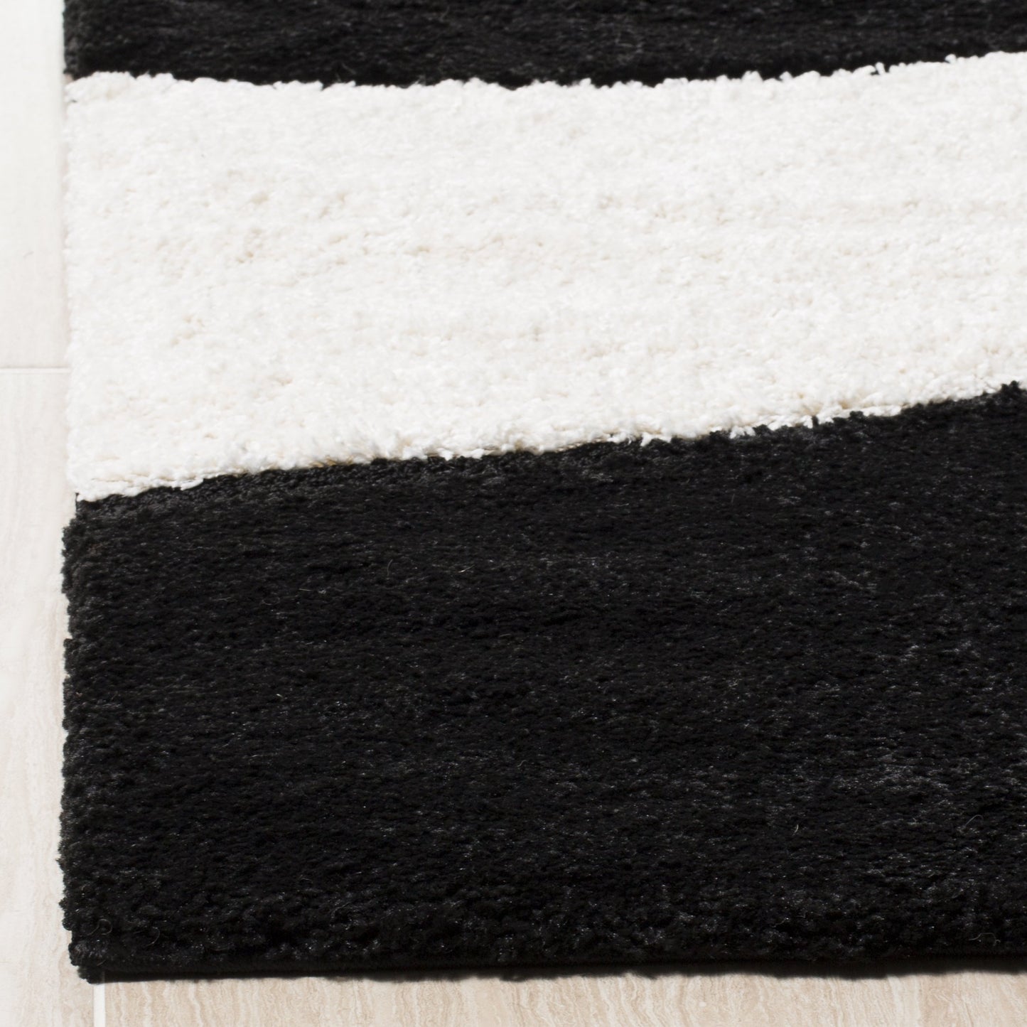 SAFAVIEH Florida Shag Collection Accent Rug - 3'3" x 5'3", Black & Ivory, Non-Shedding & Easy Care, 1.2-inch Thick Ideal for High Traffic Areas in Entryway, Living Room, Bedroom (SG474-9012)