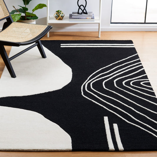 SAFAVIEH Area Rug 8x10 - Rodeo Drive Collection - Large - Black & Ivory, Handmade Wool, Mid-Century Modern Design, Ideal for Living Room, Bedroom, Office, Dining Space (RD860Z)