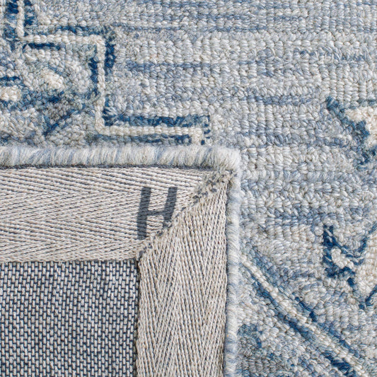 SAFAVIEH Micro-Loop Collection Accent Rug - 2'3" x 5', Light Blue & Ivory, Handmade Shabby Chic Wool, Ideal for High Traffic Areas in Entryway, Living Room, Bedroom (MLP504M)