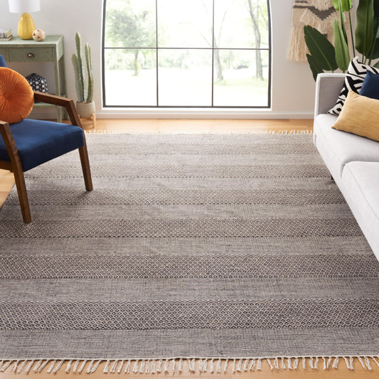 SAFAVIEH Montauk Collection Area Rug - 8' x 10', Ivory & Anthracite, Handmade Flat Weave Boho Farmhouse Cotton Tassel Fringe, Ideal for High Traffic Areas in Living Room, Bedroom (MTK330N)