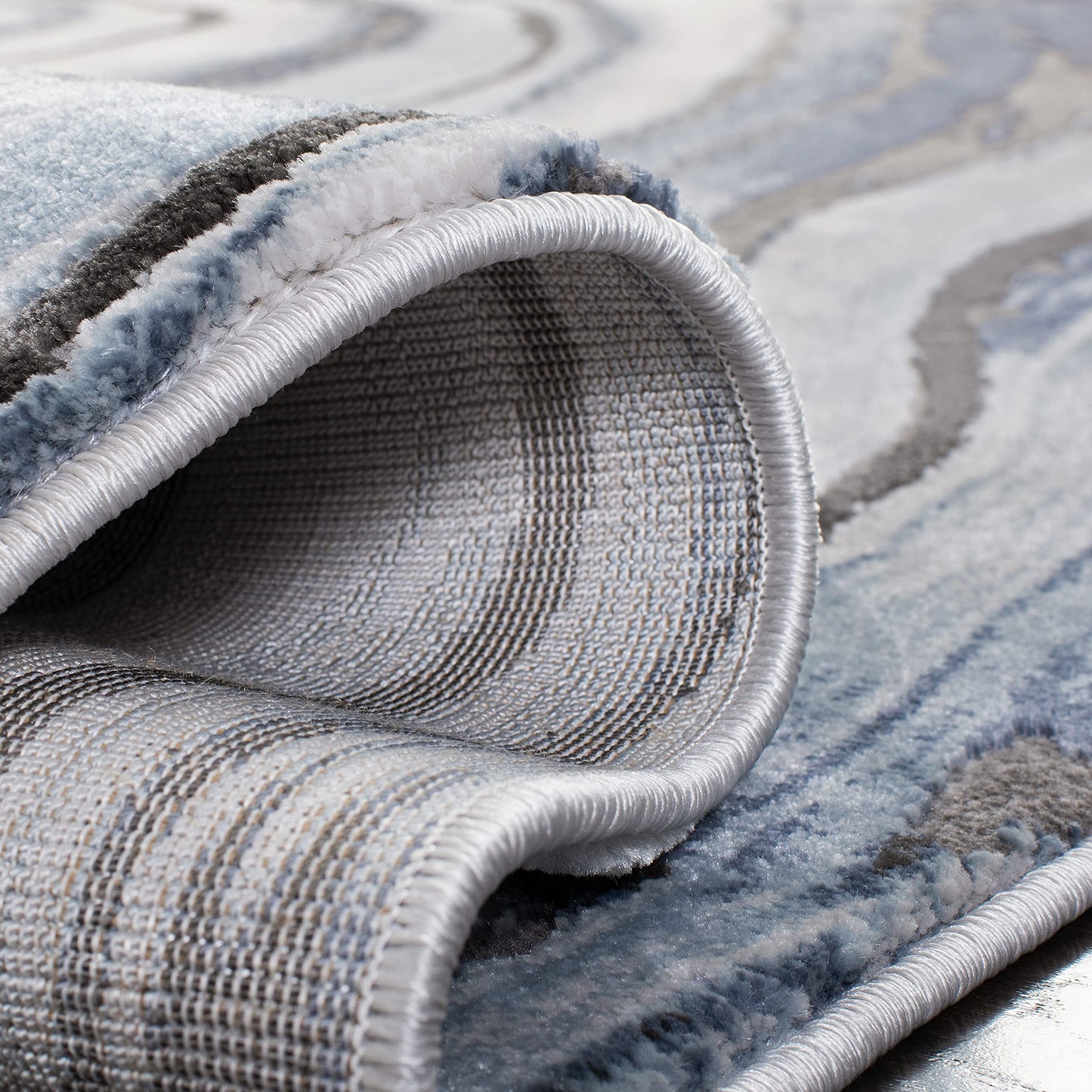 SAFAVIEH Craft Collection Area Rug - 6'7" x 9', Blue & Grey, Modern Abstract Design, Non-Shedding & Easy Care, Ideal for High Traffic Areas in Living Room, Bedroom (CFT819M)