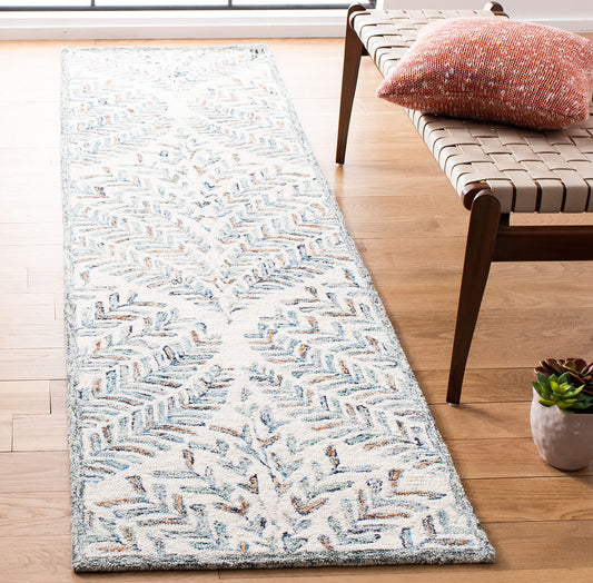 SAFAVIEH Capri Collection Area Rug - 2'3" x 11', Ivory & Blue, Handmade Wool, Ideal for High Traffic Areas in Living Room, Bedroom (CPR208A)