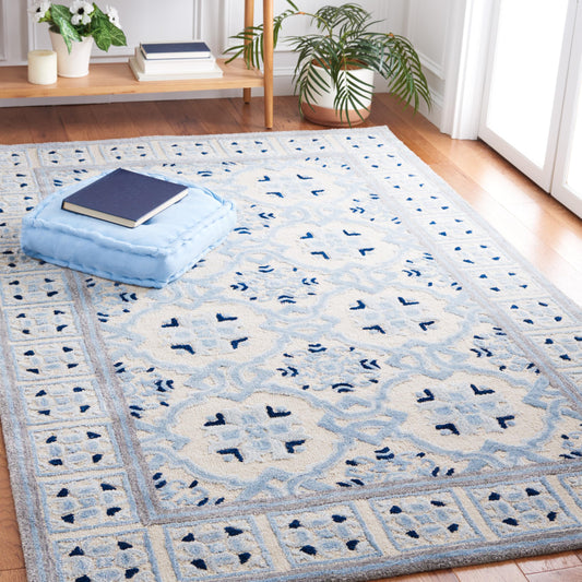 SAFAVIEH Bella Collection Area Rug - 5' x 8', Ivory & Blue, Handmade Wool & Viscose, Ideal for High Traffic Areas in Living Room, Bedroom (BEL155A)