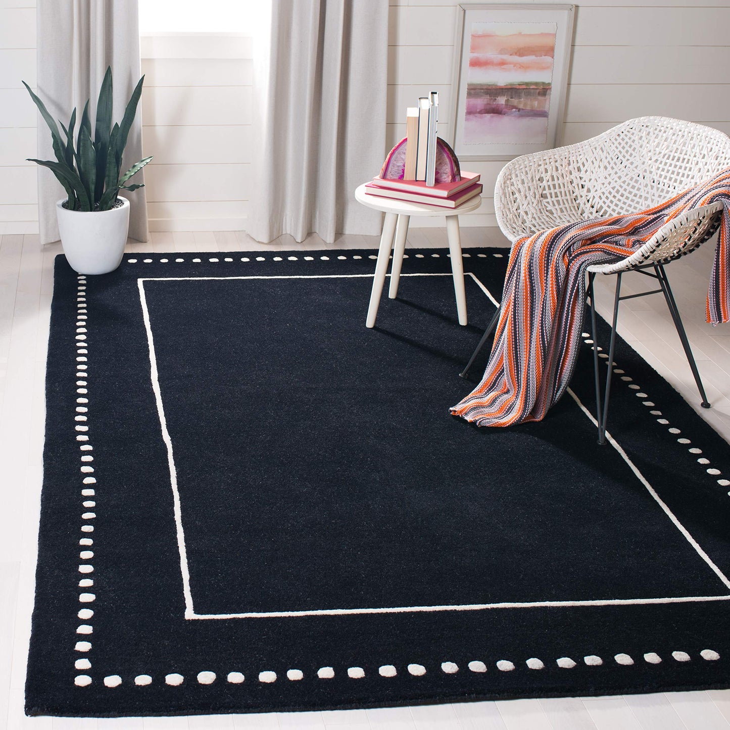 SAFAVIEH Bella Collection Accent Rug - 2' x 3', Black & Ivory, Handmade Dotted Border Wool, Ideal for High Traffic Areas in Entryway, Living Room, Bedroom (BEL151E)