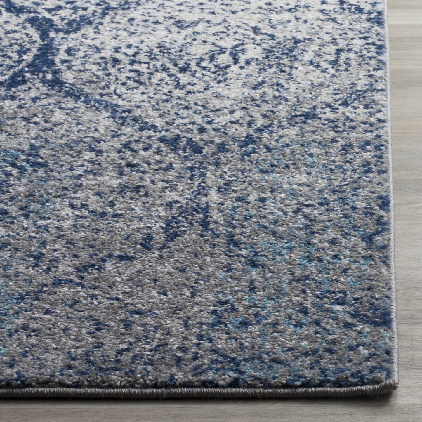 SAFAVIEH Madison Collection Area Rug - 6'7" x 9'2", Navy & Silver, Glam Ogee Trellis Distressed Design, Non-Shedding & Easy Care, Ideal for High Traffic Areas in Living Room, Bedroom (MAD604G)