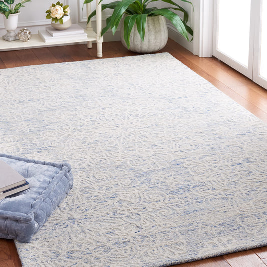 SAFAVIEH Metro Collection Accent Rug - 4' x 6', Blue & Ivory, Handmade Floral Wool, Ideal for High Traffic Areas in Entryway, Living Room, Bedroom (MET885M)