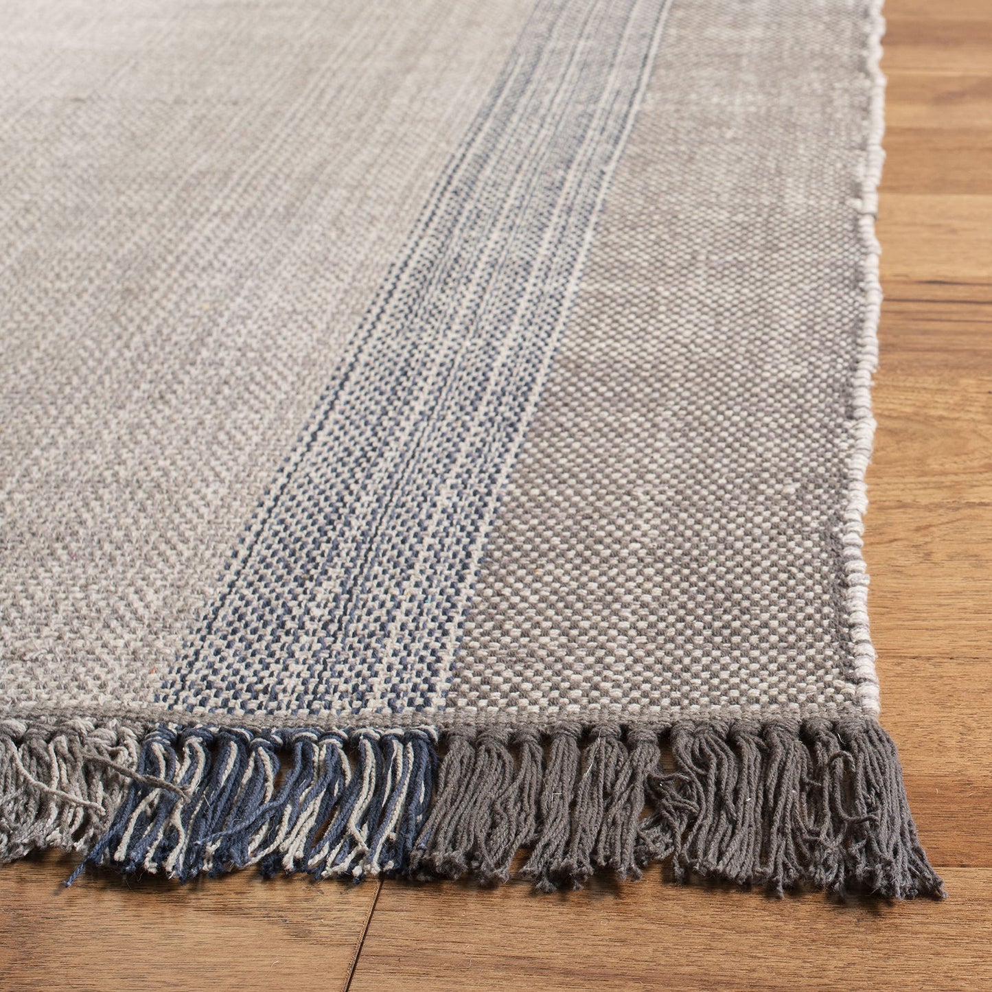 SAFAVIEH Montauk Collection Area Rug - 9' x 12', Blue & Grey, Handmade Flat Weave Boho Farmhouse Cotton Stripe Fringe, Ideal for High Traffic Areas in Living Room, Bedroom (MTK301M)