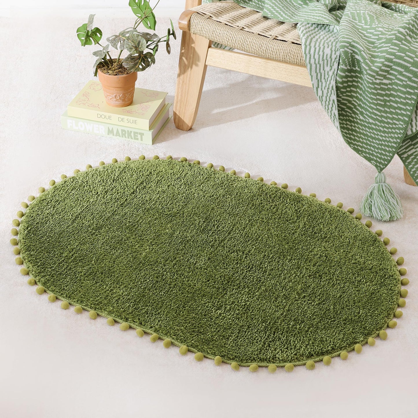 YIRDDEO Bath Mat Olive Green Oval Rug with Pom Bathroom Rugs for Bedroom Non Slip Cute Boho Absorbent Mats Soft Plush Washable Rug (24x36 inches)