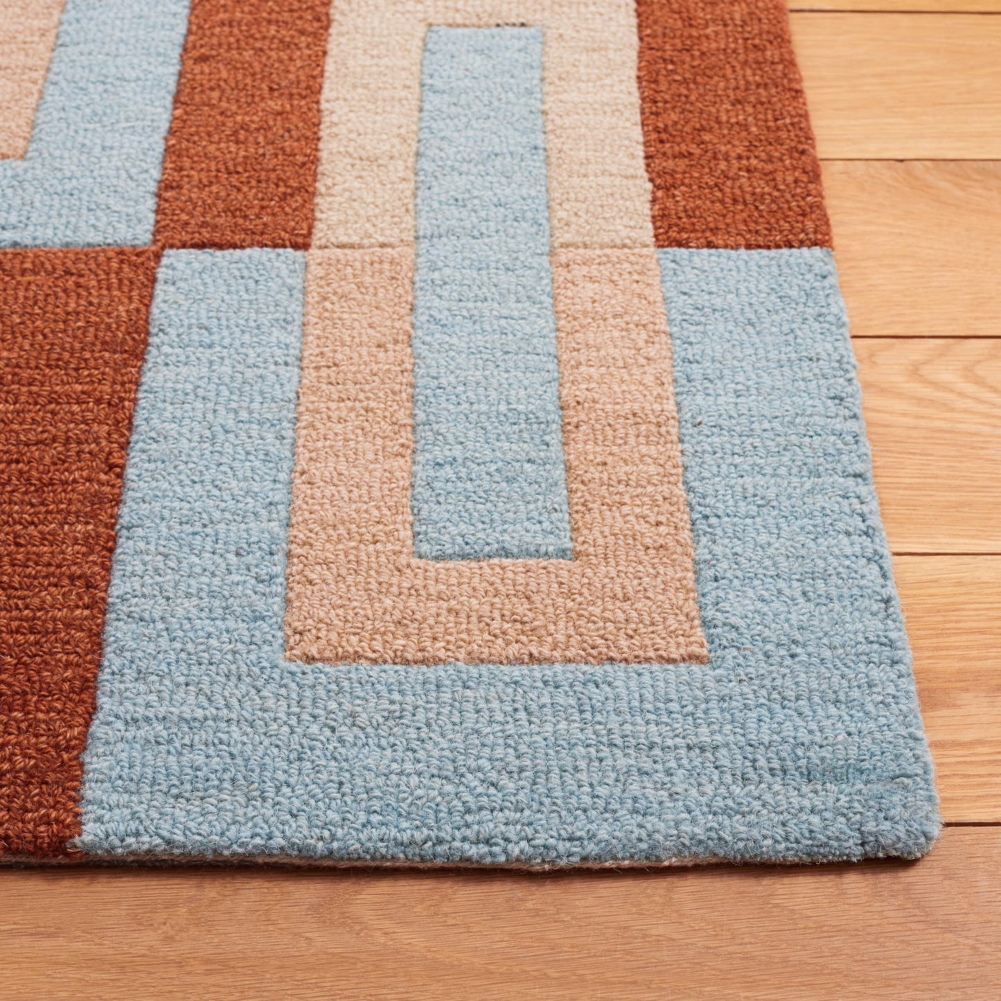 SAFAVIEH Genre Collection Area Rug - 6' x 9', Light Blue & Rust, Handmade Wool, Ideal for Living Room, Bedroom, Dining (GRE102M-6)