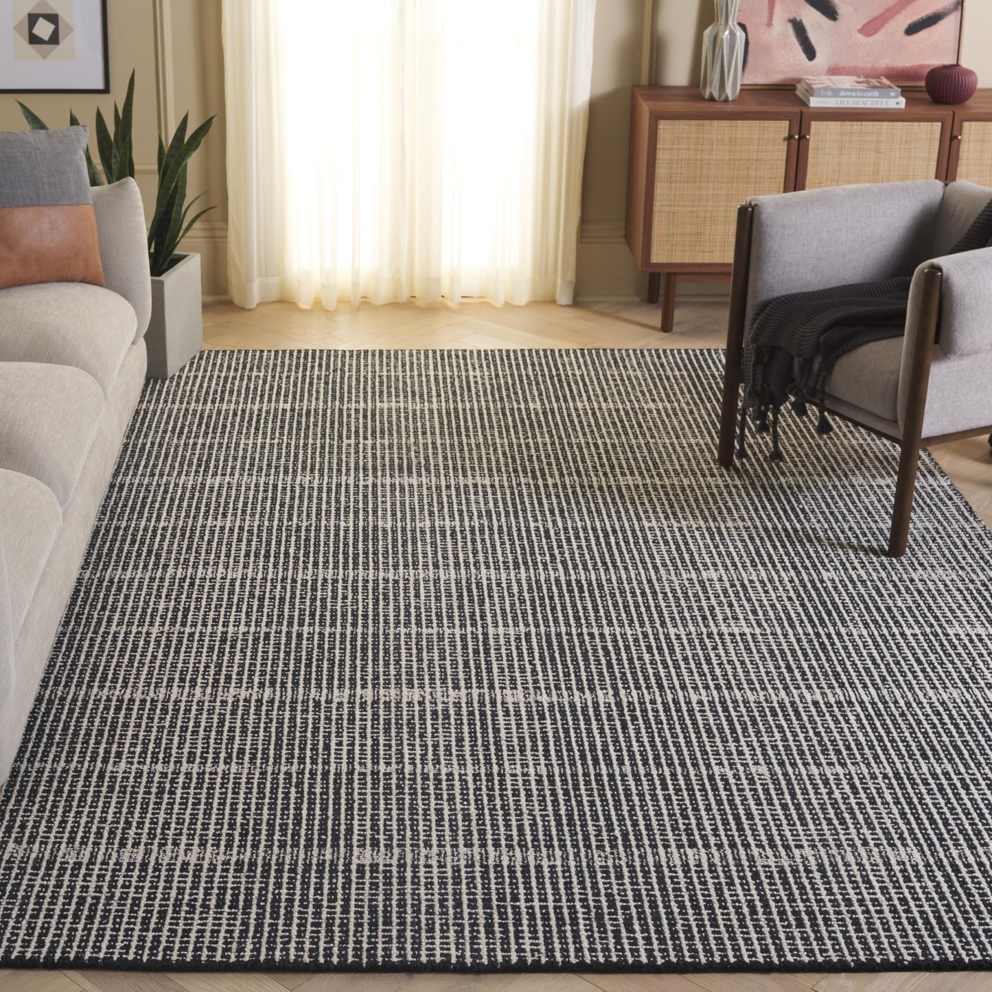 SAFAVIEH Abstract Collection Area Rug - 6' x 9', Black & Ivory, Handmade Wool, Ideal for High Traffic Areas in Living Room, Bedroom (ABT482Z)
