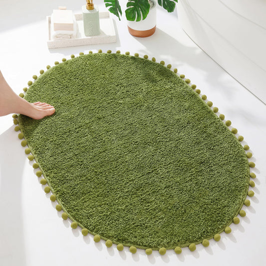 YIRDDEO Bath Mat Olive Green Oval Rug with Pom Bathroom Rugs for Bedroom Non Slip Cute Boho Absorbent Mats Soft Plush Washable Rug (24x36 inches)