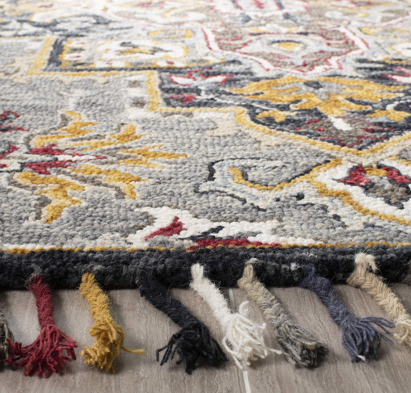 SAFAVIEH Aspen Collection Area Rug - 7' Square, Grey & Charcoal, Handmade Boho Braided Tassel Wool, Ideal for High Traffic Areas in Living Room, Bedroom (APN207F)