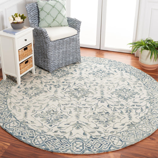 SAFAVIEH Dip Dye Collection Area Rug - 9' Round, Blue & Ivory, Handmade Wool, Ideal for High Traffic Areas in Living Room, Bedroom (DDY901M)