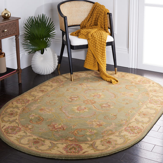 SAFAVIEH Heritage Collection Area Rug - 7'6" x 9'6" Oval, Green & Gold, Handmade Traditional Oriental Wool, Ideal for High Traffic Areas in Living Room, Bedroom (HG811A)