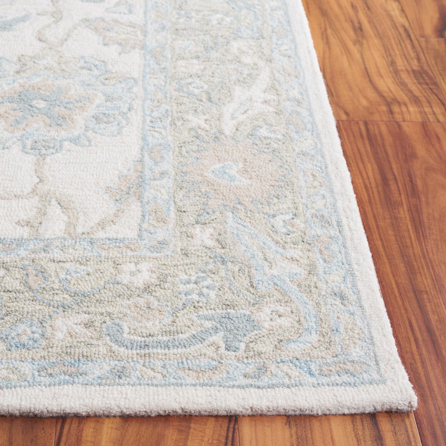 SAFAVIEH Ebony Collection Area Rug - 5' x 8', Ivory & Blue, Handmade Wool, Ideal for The Living Room, Bedroom, Dining Room (EBN136M-5)