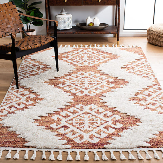 SAFAVIEH Moroccan Tassel Shag Collection Area Rug - 6'7" x 9'2", Orange & Ivory, Boho Design, Non-Shedding & Easy Care, 2-inch Thick Ideal for High Traffic Areas in Living Room, Bedroom (MTS652P)