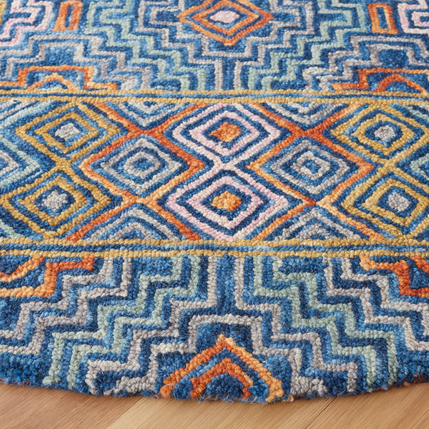 SAFAVIEH Aspen Collection Area Rug - 6' Round, Blue & Gold, Handmade Boho Wool, Ideal for High Traffic Areas in Living Room, Bedroom (APN273M)