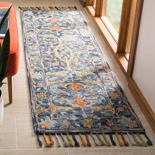 SAFAVIEH Aspen Collection Runner Rug - 2'3" x 7', Blue & Rust, Handmade Boho Braided Tassel Wool, Ideal for High Traffic Areas in Living Room, Bedroom (APN116M)