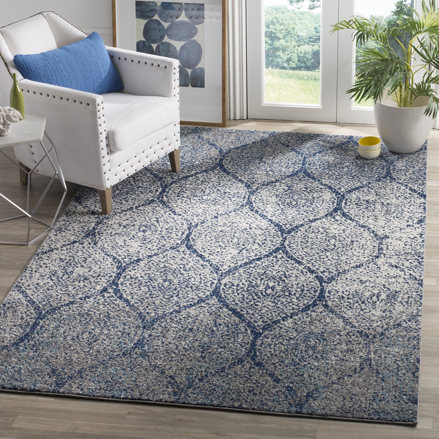 SAFAVIEH Madison Collection Area Rug - 6'7" x 9'2", Navy & Silver, Glam Ogee Trellis Distressed Design, Non-Shedding & Easy Care, Ideal for High Traffic Areas in Living Room, Bedroom (MAD604G)
