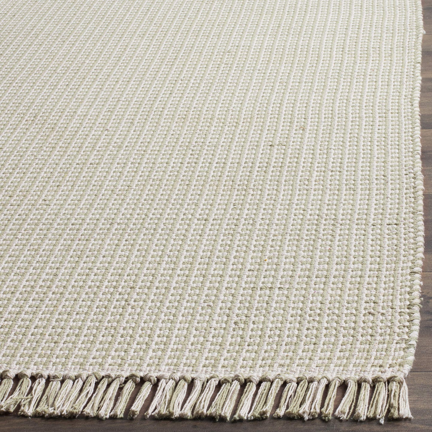 SAFAVIEH Montauk Collection Area Rug - 6' x 9', Ivory & Green, Handmade Flat Weave Boho Farmhouse Cotton Tassel Fringe, Ideal for High Traffic Areas in Living Room, Bedroom (MTK340G)