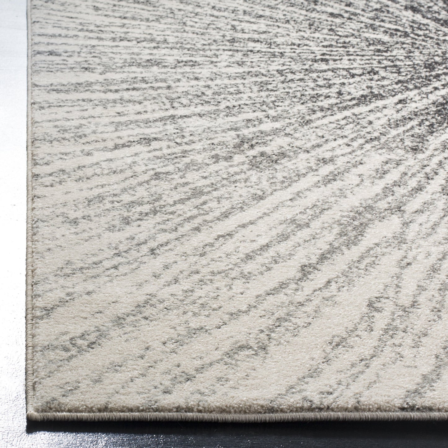 SAFAVIEH Evoke Collection Area Rug - 6'7" Square, Black & Ivory, Abstract Burst Design, Non-Shedding & Easy Care, Ideal for High Traffic Areas in Living Room, Bedroom (EVK228K)
