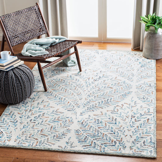 SAFAVIEH Capri Collection Area Rug - 6' x 9', Ivory & Blue, Handmade Wool, Ideal for High Traffic Areas in Living Room, Bedroom (CPR208A)